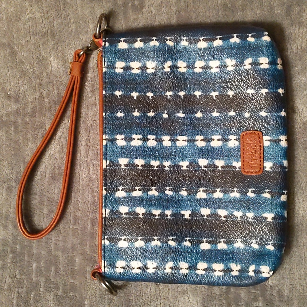 The Sak Wristlet in tie dye, blue, white and brown
